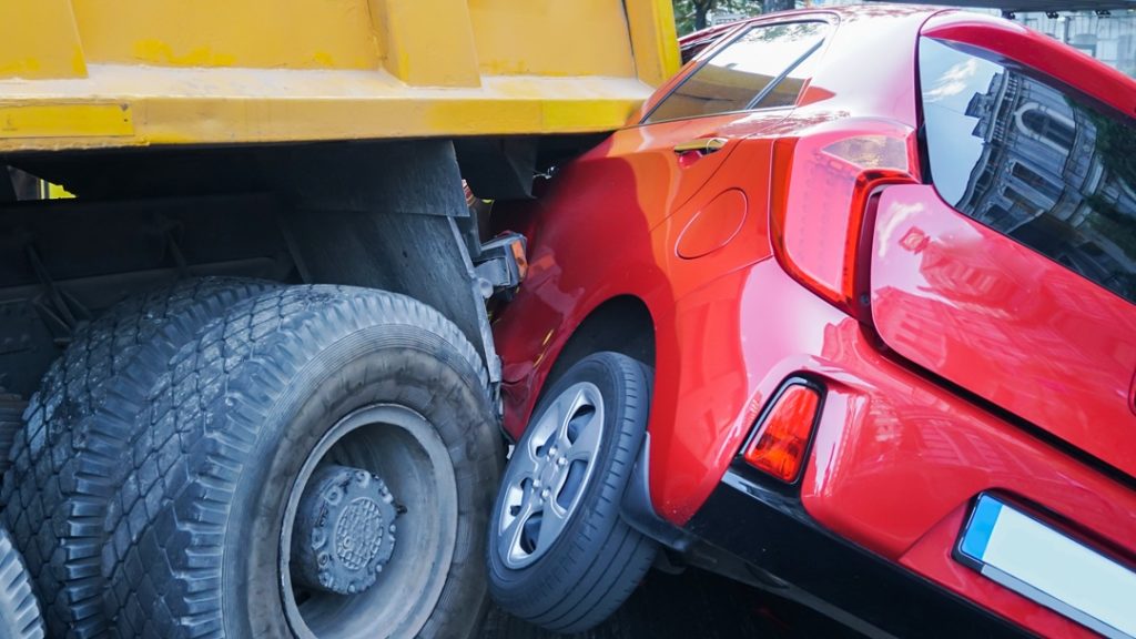 Delivery Truck Hits Car